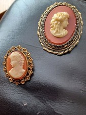 2 Cameo silhouette costume broaches. pre owned
