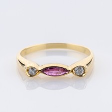 750 yellow gold ring with 0.20ct ruby and 0.08ct diamonds
