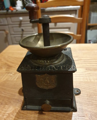 Antique cast iron coffee - cast,