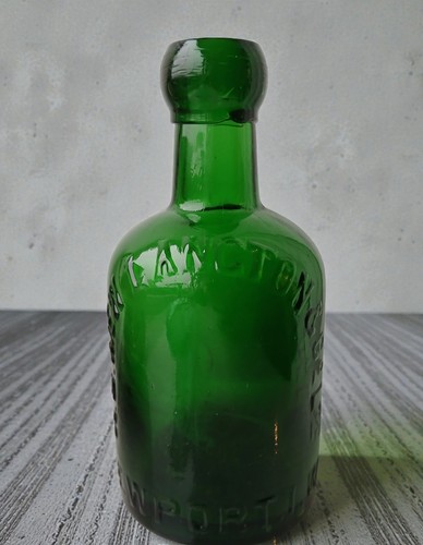 Large dumpy green glass