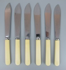6 Fish Eaters Knives. Vintage set "Unity". Chrome & faux bone handle. 7.5"