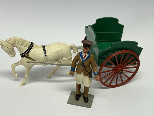Horse drawn milk - cart, and