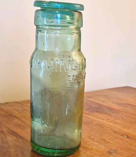 Vintage embossed green glass