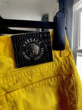 Woman bright yellowhigh-rise 1990s vintage Versace jeans couture Size 32 46 