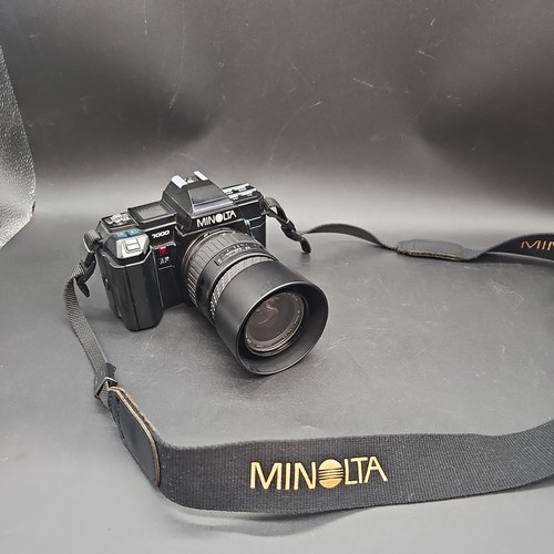 Minolta 7000 sigma auto - +,