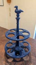 Egg Rack. Blue enamel. Cast Iron with chicken motif. holds 12 eggs