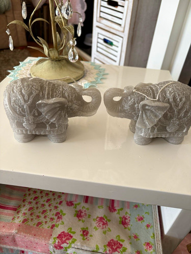 Pair grey ornate carved - pair,