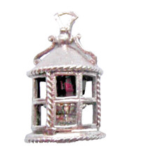 old vintage silver charm of a lamp featuring an amethyst crystal inside