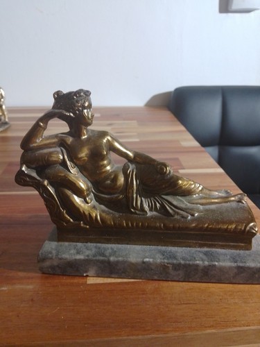 Vintage brass lady - lying, on