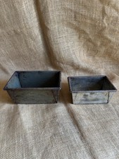 Pair vintage metal loaf - a, of