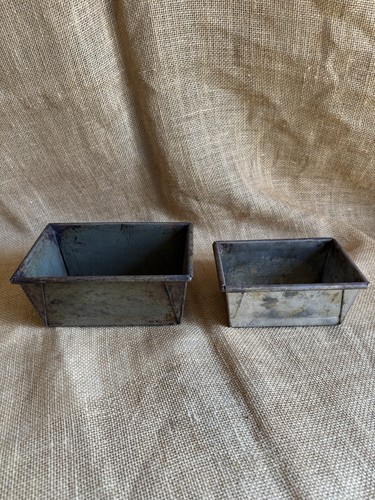 Pair vintage metal loaf - of,