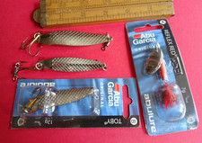 A COLLECTION OF VINTAGE ABU GARCIA FISHING LURES, SOME UNUSED