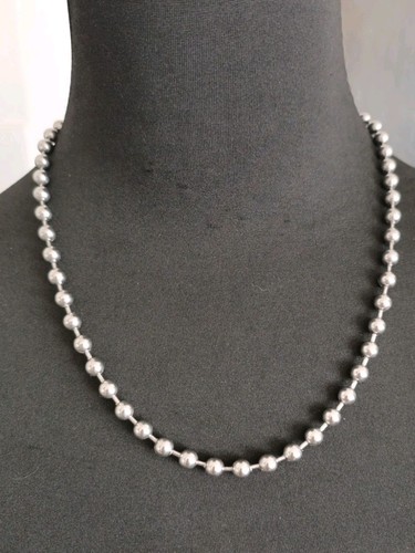 Silver tone round - tone, beaded