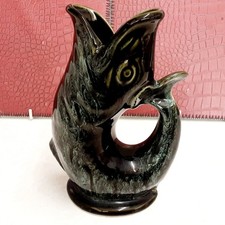 A SMAL FOSTERS GREEN MOTTLED FINISH GURGLE JUG 17cm HIGH