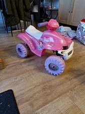 Kid's rechargeable battery ride-on Mini Quad Bike in pink with instructions 