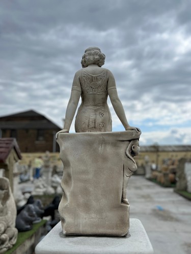 Stone goddess sculpture