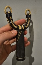 Gold and black - and, catapult