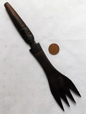 Carved wooden fork comb Face