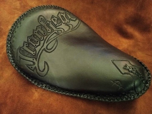 Custom tooled leather chopper - leather,