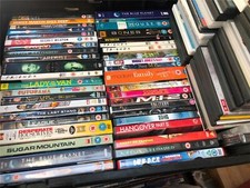 100 Mixed Used & New DVDs Job