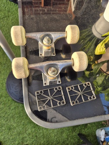 Skateboard trucks with white - trucks,
