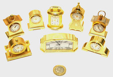 Miniature brass quartz clocks
