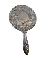 VINTAGE silver repousse hand