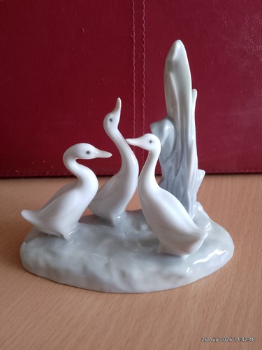 Lladro nao figurine row - lladro,