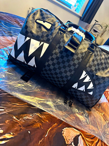 The enemy checked duffle - the,