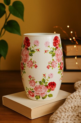 Large glass vase with roses