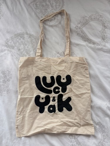 Lucy yak logo - &,