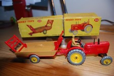 Dinky 300 Massey Harris Tractor with 320 Harvest Trailer. Both near mint .1961. 