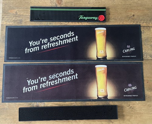 Carling rubber beer mat - x,