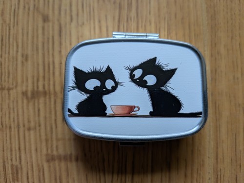 Two black cats tea - &, a