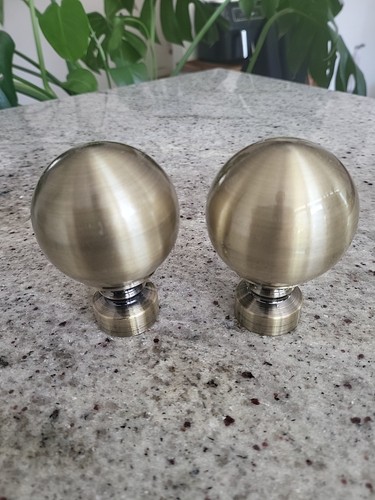 Pair curtain rod finials - of,