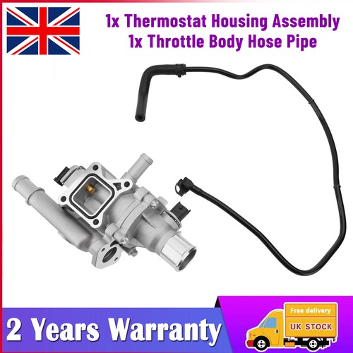 Thermostat housing water - &,