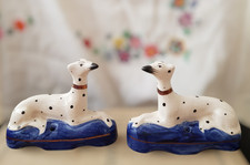 Pair of Mid century sitting  greyhound /whippet dogs. Staffordshire Ware Kent.