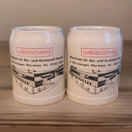 Pair vintage beer steins - of,