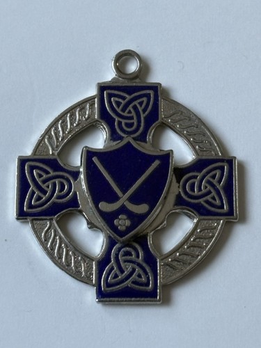Old irish hurling medal - hurling, medal.