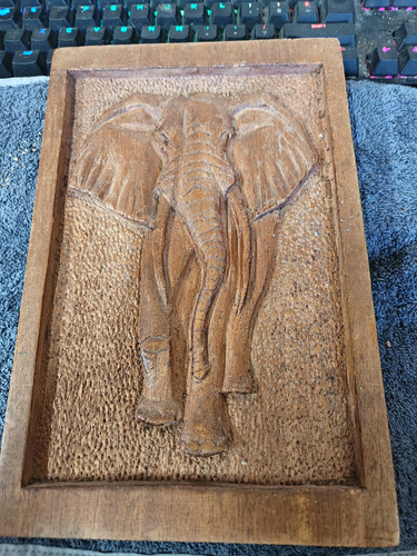 Hand carved brown wooden - carved,