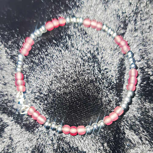Pink silver tone beaded - &,