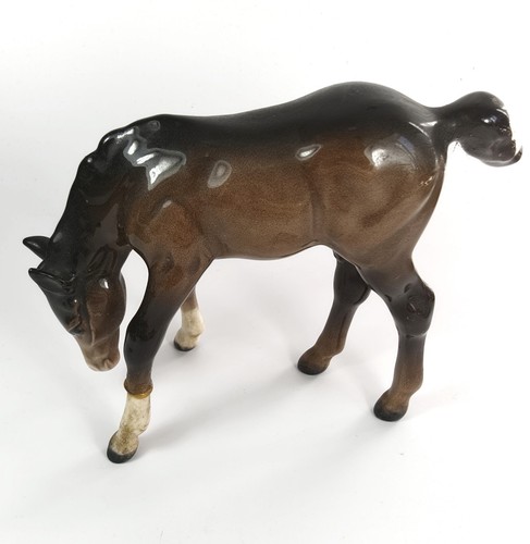 Beswick horse grazing foal