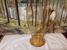 Large amber glass jug.