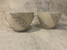 Poole Pottery cups. Feather