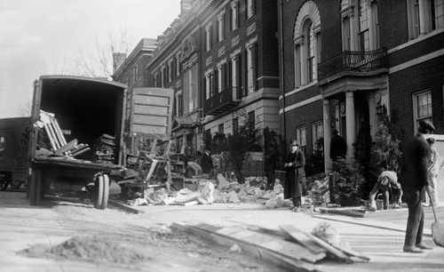 Moving truck outside - , houses