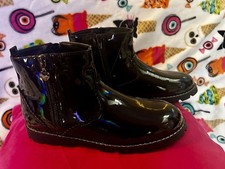Woman’s Black Patent Boots