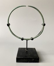 Ancient Bronze Age Richly Patinated Bronze Neck Torc with stand C.1400-1100 B.C.