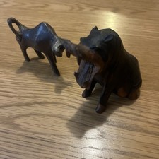 Dark wooden calved animal - dark,