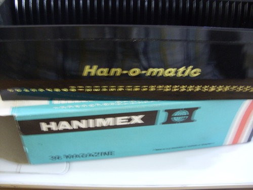Two hanimex han matic slide - two,