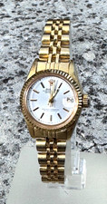 ladies gold plated watch on gold plated bracelet new battery fitted